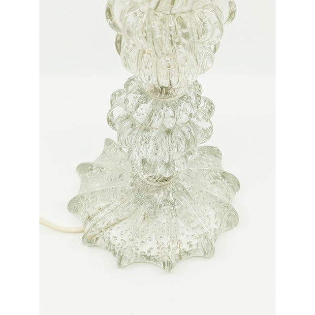 A large and impressive lamp base in clear Murano glass with bubbles ("bulicante"), most likely from the Barovier & Toso...