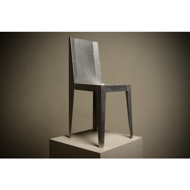 This 1980s prototype chair is a masterful collision of architectural design and avant-garde artistry. The chair serves...