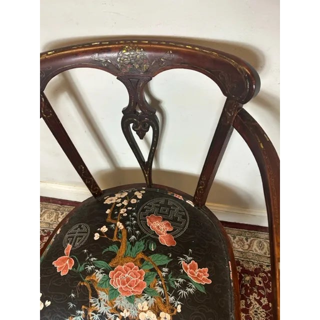 Elevate your living space with this captivating Antique Asian Accent Chair adorned with delicate Mother of Pearl inlay....