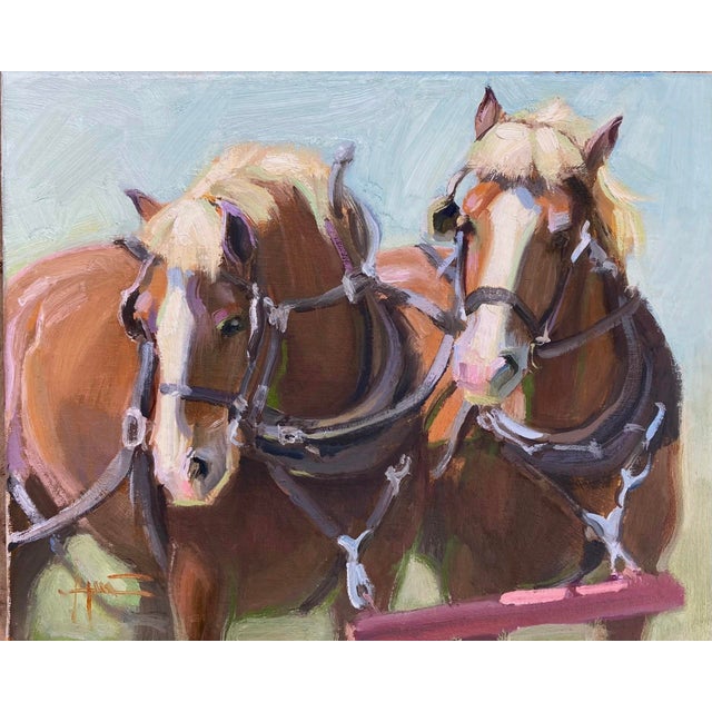 This oil painting captures two majestic horses side by side, their expressive eyes and strong forms conveying a sense of...
