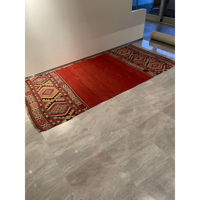The colors used in traditional kilims are often of natural origin and carry specific meanings. Red: Often symbolizes luck,...