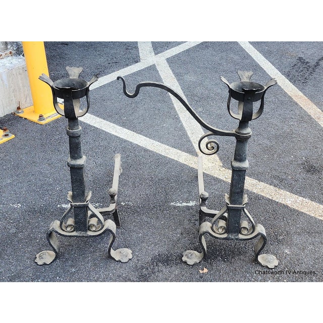 This is a very fine pair of late 18th or very early 19th century Antique French basket top hand wrought iron andirons or...