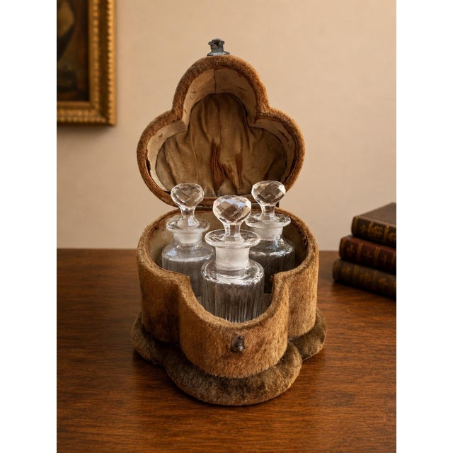 A beautiful 19th century French travel perfume caddy, made to hold three fitted cut-glass perfume bottles in the original...
