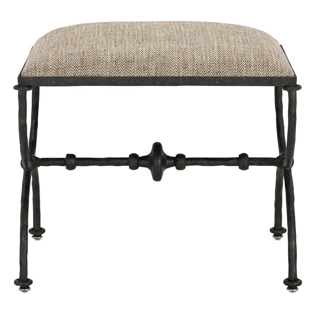 The curvaceous sides and the ornamented stretcher of the Agora Peppercorn Ottoman are made of iron in a rustic bronze...