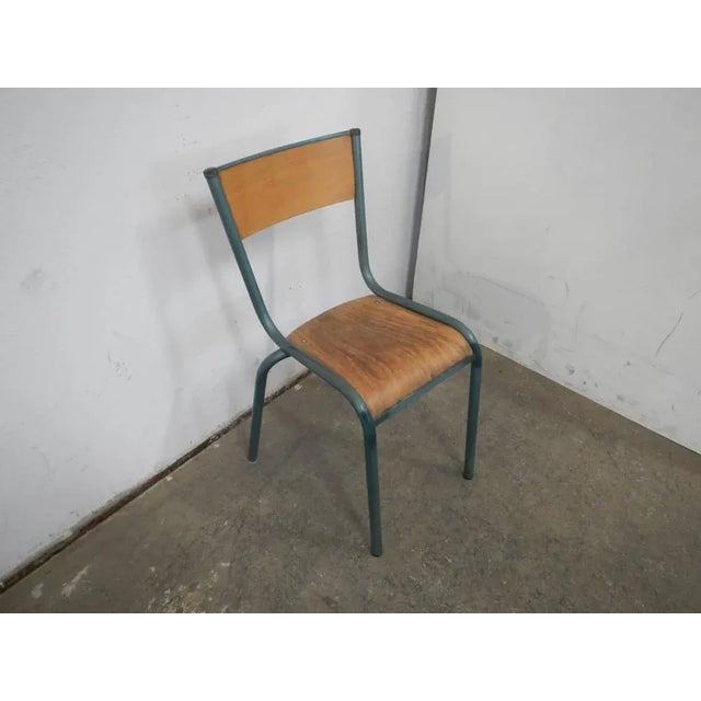 Chair from Mullca, 1960s, in Good conditions. Designed 1960 to 1969 This piece is attributed to the mentioned...