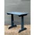 This vintage side table showcases a classic trestle-style construction, its rectangular wooden top resting atop two...