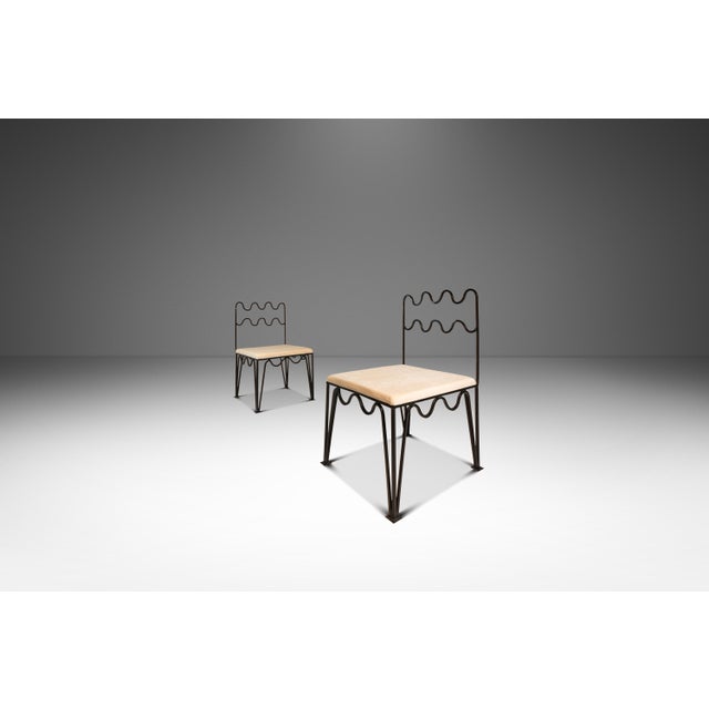 This elegant pair of Méandre side chairs by Design Frères captures the fluid, sculptural spirit of Jean Royère’s iconic...