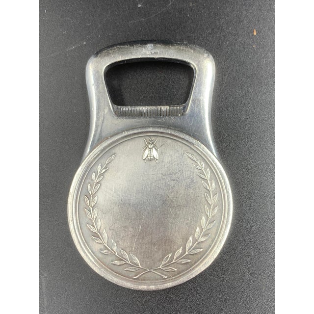 Napoleon Empereur bottle opener made by Christofle of France. Beautiful and substantial piece. Please review photographs...