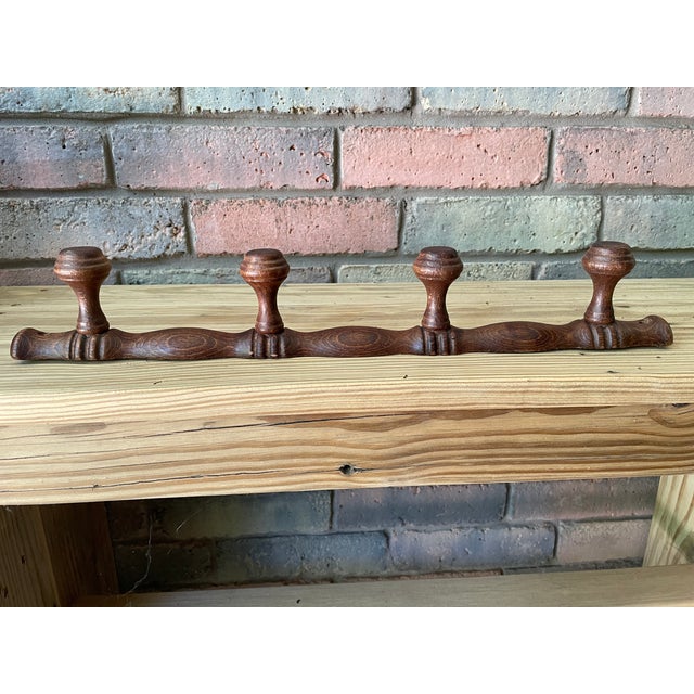 A fine French four peg Faux Bamboo (Chambre en Bambou) wooden wall coat and hat rack made in France. Circa 1960s-70s. This...