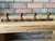 A fine French four peg Faux Bamboo (Chambre en Bambou) wooden wall coat and hat rack made in France. Circa 1960s-70s. This...