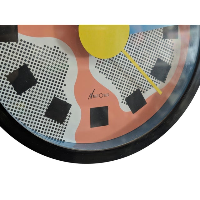 Vintage Neos wall clock made in Italy by Lorenz, designed by renowned designers Nathalie Du Pasquier and George Sowden,...