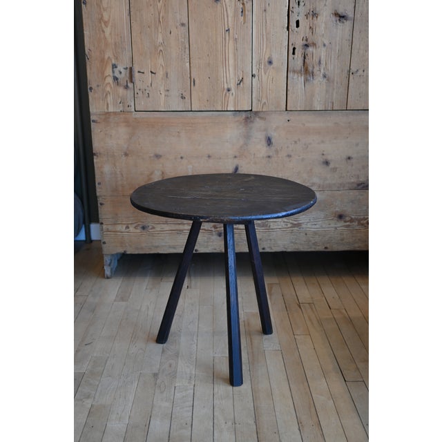 Versatile and charming. A primitive English cricket table in oak. Simple construction with a round table top and tripod...