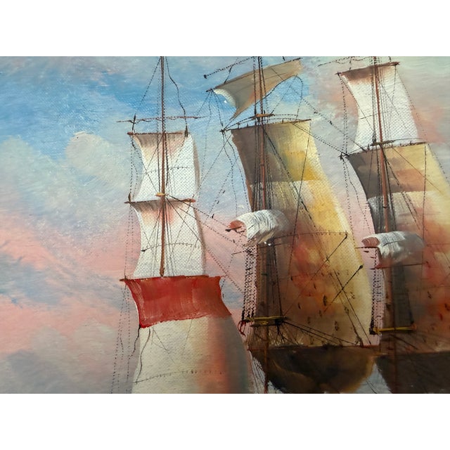A striking vintage oil painting on canvas depicting an intense naval engagement at sea, where two historic sailing...
