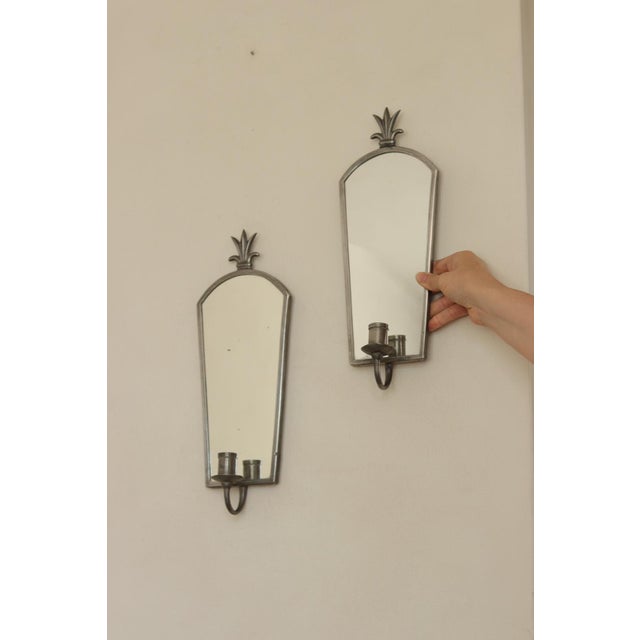 An amazing pair of early century swedish grace style sconces by nils erik nordströms tennverkstad, 1926. both sconces are...