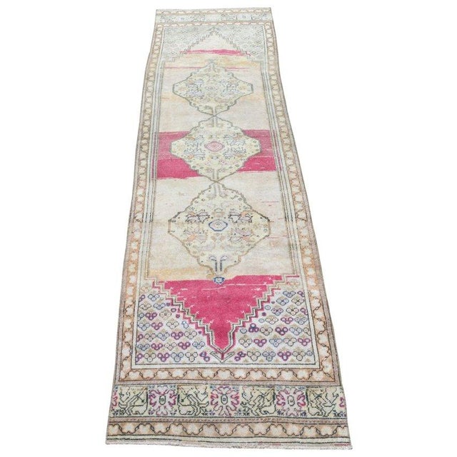 Hand-knotted with care using traditional rug-making techniques, this wool rug blends timeless craftsmanship with a modern...