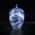 A charming small Chinese blue and white porcelain covered jar. The jar features a traditional landscape scene with...