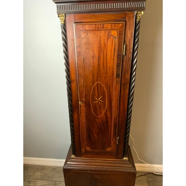 A very attractive Scottish Tall case clock signed by Thomas Yuill East Kilbride. Beautifully fan and string inlay...