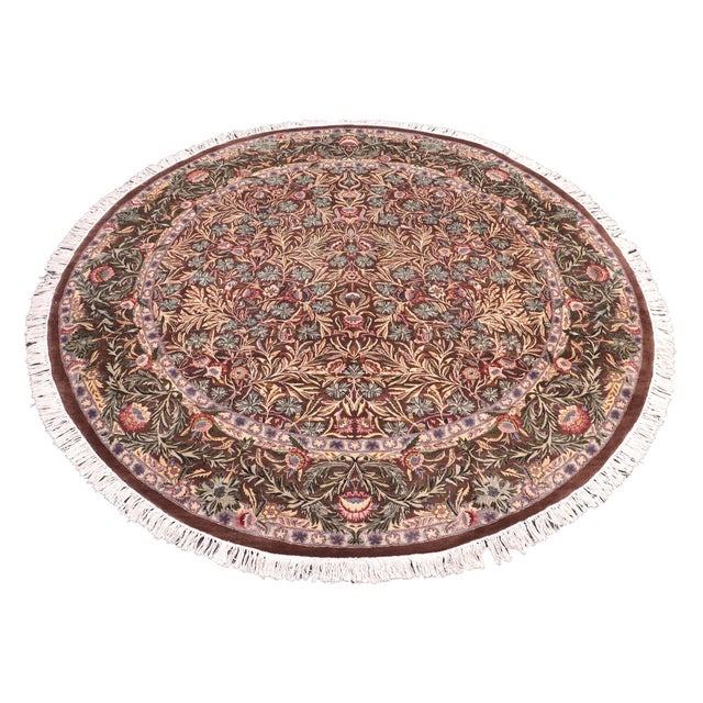 This hand‑knotted Pak Persian round rug showcases the finest expression of traditional Persian artistry. Each piece is...