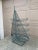 A charming green wrought iron wine rack in the form of a sailboat, perfect for your Nantucket, Cape, or Hamptons home!...