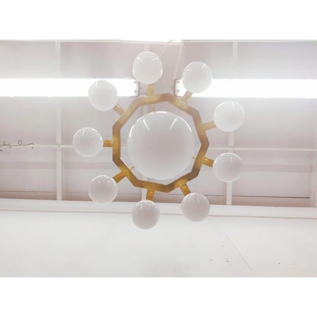 Mid-Century Modern Brass Chandelier with 10 White Globe Lights For Sale - Image 3 of 18