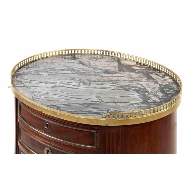 Vintage oval bedside is a design item realized in the Early 20th Century. Antique French Gueridon oval-shaped centerpiece...