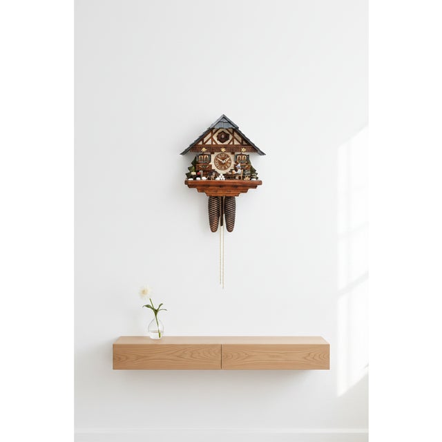 A humorous, handcrafted Black Forest cuckoo clock with a beer drinker motif - ideal for people who love Bavarian coziness...