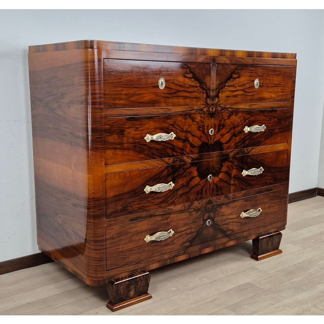 Elegant, refined, and compact, this Venetian Art Deco chest of drawers is made entirely of burl wood and walnut quill....