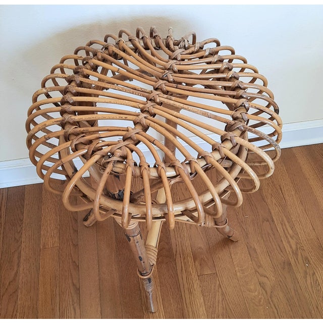 Vintage Mid-Century Rattan and Bamboo Plant Stand. Sturdy and well-sized, this stand is a rare find as it is one of the...