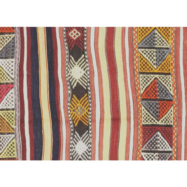 1950s Turkish Kilim Rug. Hand woven with wool on wool foundation in the Oushak region of Turkey. Kilims & Flat Weaves are...