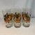This is a set of vintage mid-century modern Culver "Yule Horn" highball glasses featuring 22-karat gold accents and a...