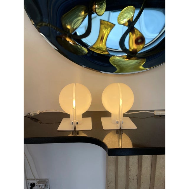 Mid-Century Modern Space Age pair of lucite plastic methacrylate table or bedside lamps, model Sirio by the italian...