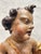 Large Putto, Southern Germany / Tyrol, c. 1750 Wood carving Dimensions: 79 x 55.5 x 24.5 cm paint in places damaged (see...
