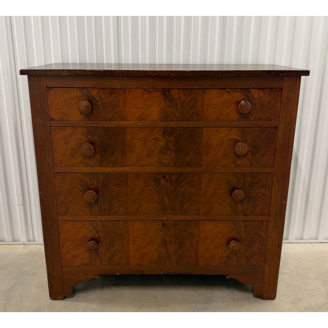 A beautiful American empire four drawer chest, c 1840’s. Presumed to be mahogany with wonderful flame-like figured veneer...