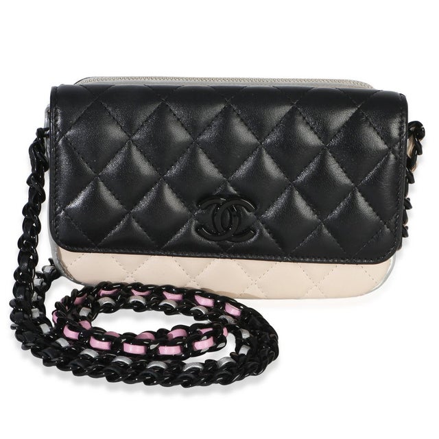 Item #: 154469 Features Interior: One zip pocket. Three card slots Dimensions: 6.75 x 3.75 x 1.25 in Handbag Closure Type:...