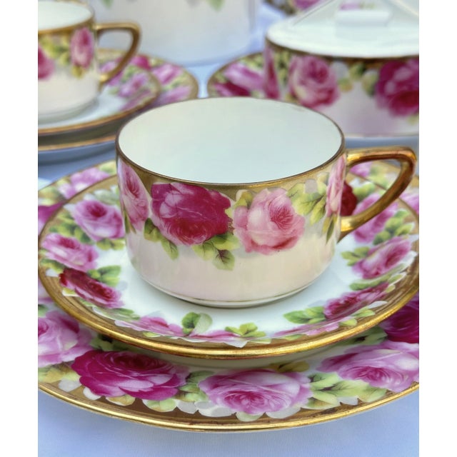 This exquisite Beyer & Bock Tausendschön 42-piece coffee, tea, and dessert service for 12 is a breathtaking example of...