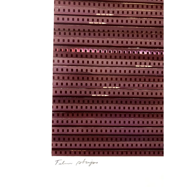This one depicts an abstract assemblage of film strip (still or movie film) edges in a pattern and decoration style....