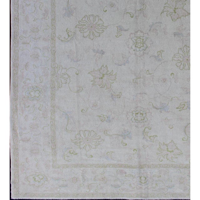 Measures: 6'8 x 9'3 Vintage Turkish Oushak Rug with Pale Ivory Ground and Soft Sage, Blush 6'8 x 9'3. Keivan Woven Arts /...