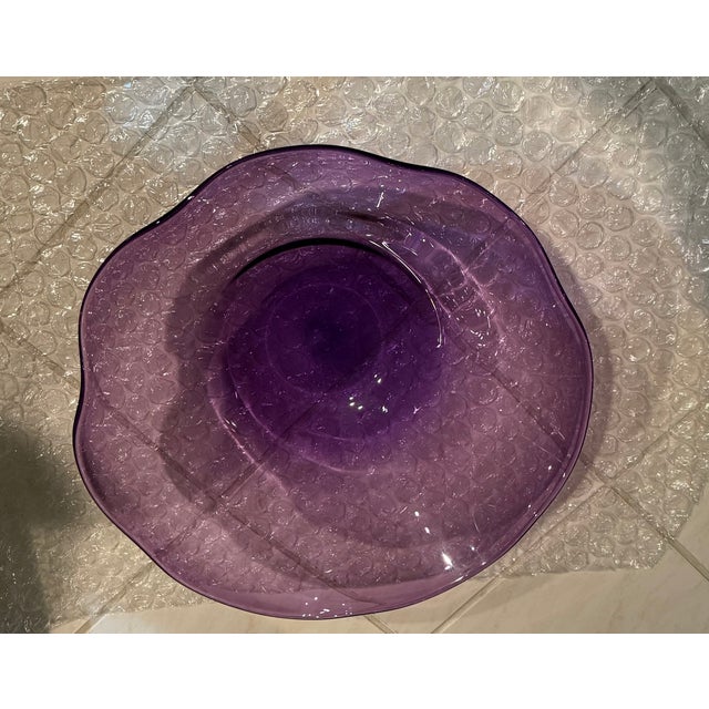 Large and lovely handblown art glass bowl in purple amethyst. Signature is a bit illegible but seems to read "Scott b....