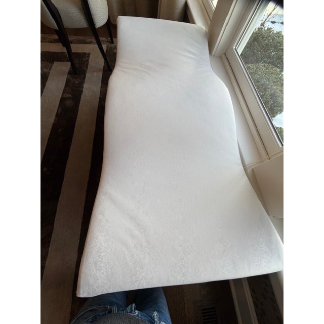 Brueton Undulatus Bench in faux white leather with custom white legs. Minor nicks as wear as seen in photos. Item is not...