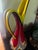 A striking vintage hand-blown art glass vase standing an impressive 20 inches tall. This sculptural piece features a...