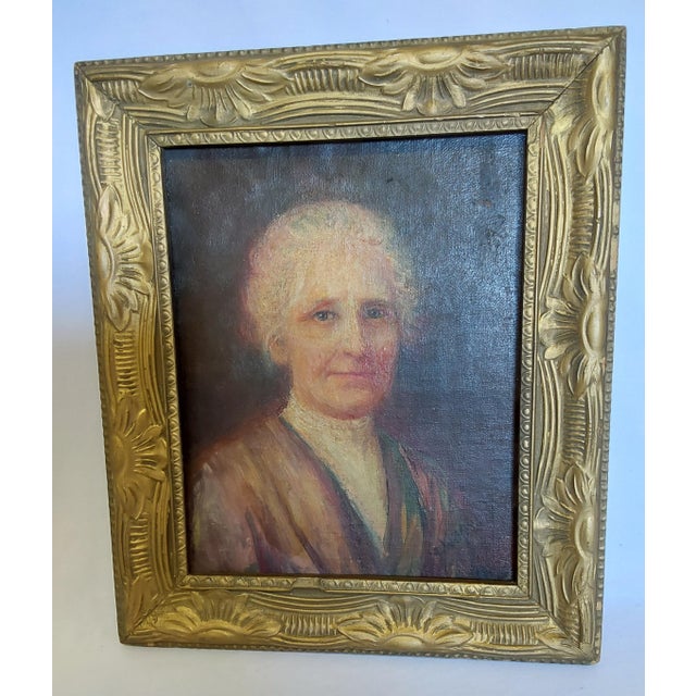 An Antique Oil Painting of a Lady with white hair. the Portrait is well done but is not signed that I can find. The Lady...