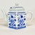 Offering a very pretty blue and white porcelain tea pot. The style is English Garden with a Hollywood Regency flair. It...
