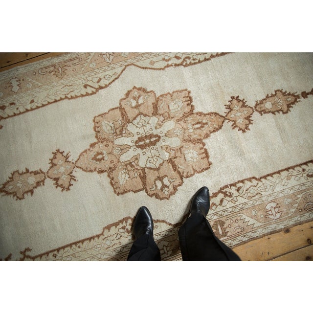 :: Starburst center medallion with double tiered end finials atop an open main field with book cover stylized overlay....