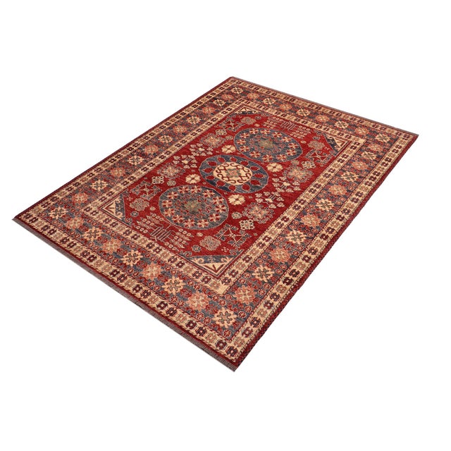 Enhance your home with this exquisite hand-knotted Super Kazak rug, crafted from fine hand-spun wool and dyed with all-...