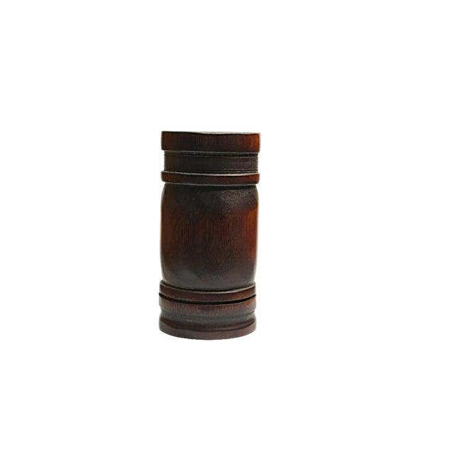 Handcrafted from rich, dark wood, this vintage bamboo brush pot is a testament to timeless elegance. Its smooth, polished...