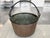 This antique copper cauldron was hand-crafted in France in the 19th Century. It has a hand-forged iron handle and rounded...
