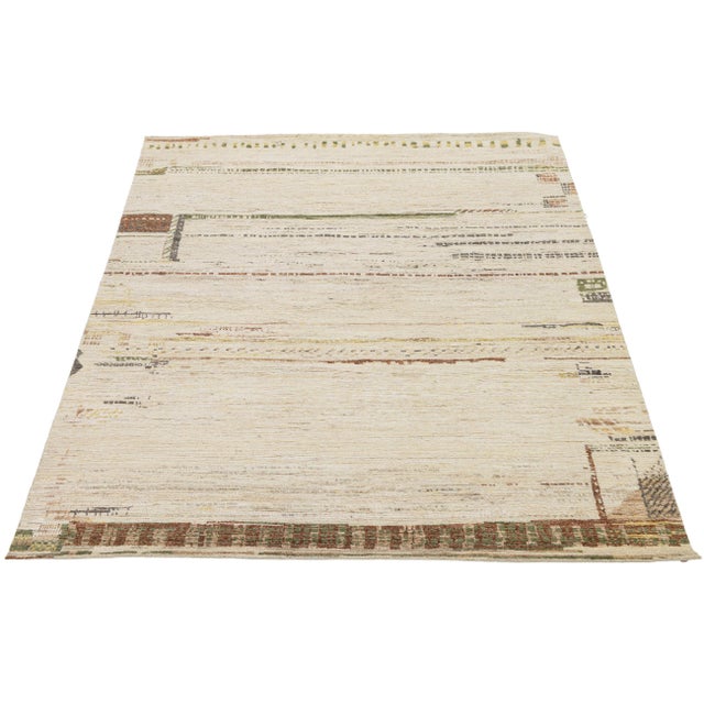 Enhance your space with this hand-knotted Modern Moroccan-style rug made from high-quality natural wool. Inspired by...