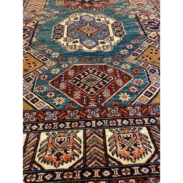 This particular Hand Knotted Fine Rug is made of 75% wool & 25% cotton, dyed with pigment from vegetables. This piece has...