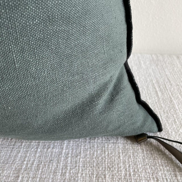 Custom linen blend accent pillow. Color: Canard Blue / grey colored nubby textured style pillow with a stitched edge,...