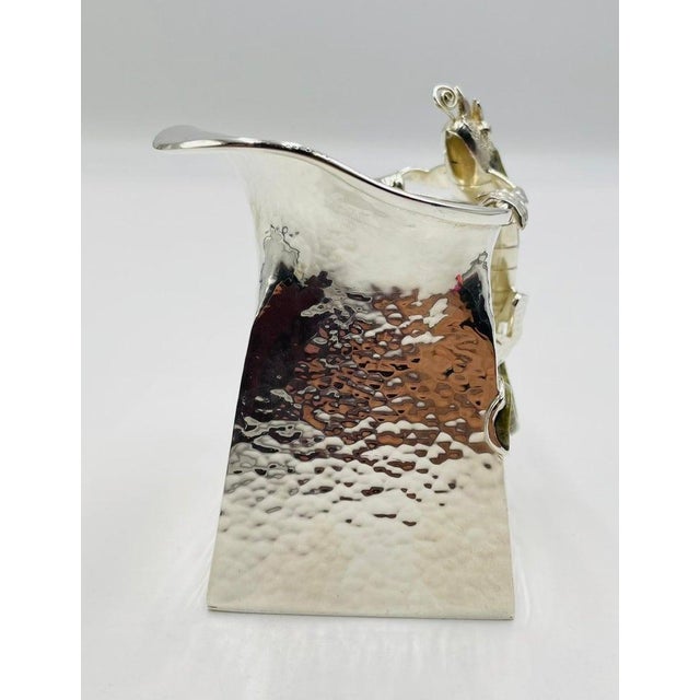 A rare and character-rich 1950s silver-plated creamer designed and handcrafted by Wolmar Castillo for the famed Taller de...